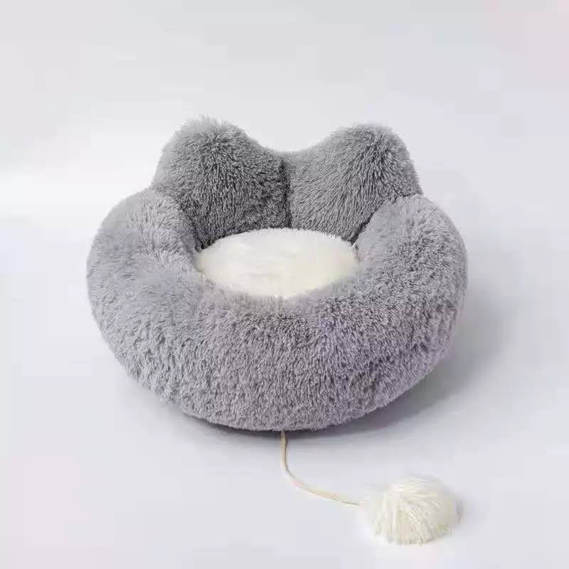 Introducing the Cozy Plush Pet Bed, the ultimate nap spot for your furry friend! This ultra-soft and snuggly bed is designed for pets of all shapes and sizes, offering superior comfort and coziness. With its plush fabric and adorable design, your pet will love curling up for a restful snooze. The non-slip base ensures stability, making it a safe and secure choice for your home. Easy to clean and perfect for pampered pets, this bed is a must-have for keeping your cat or dog cozy and happy.