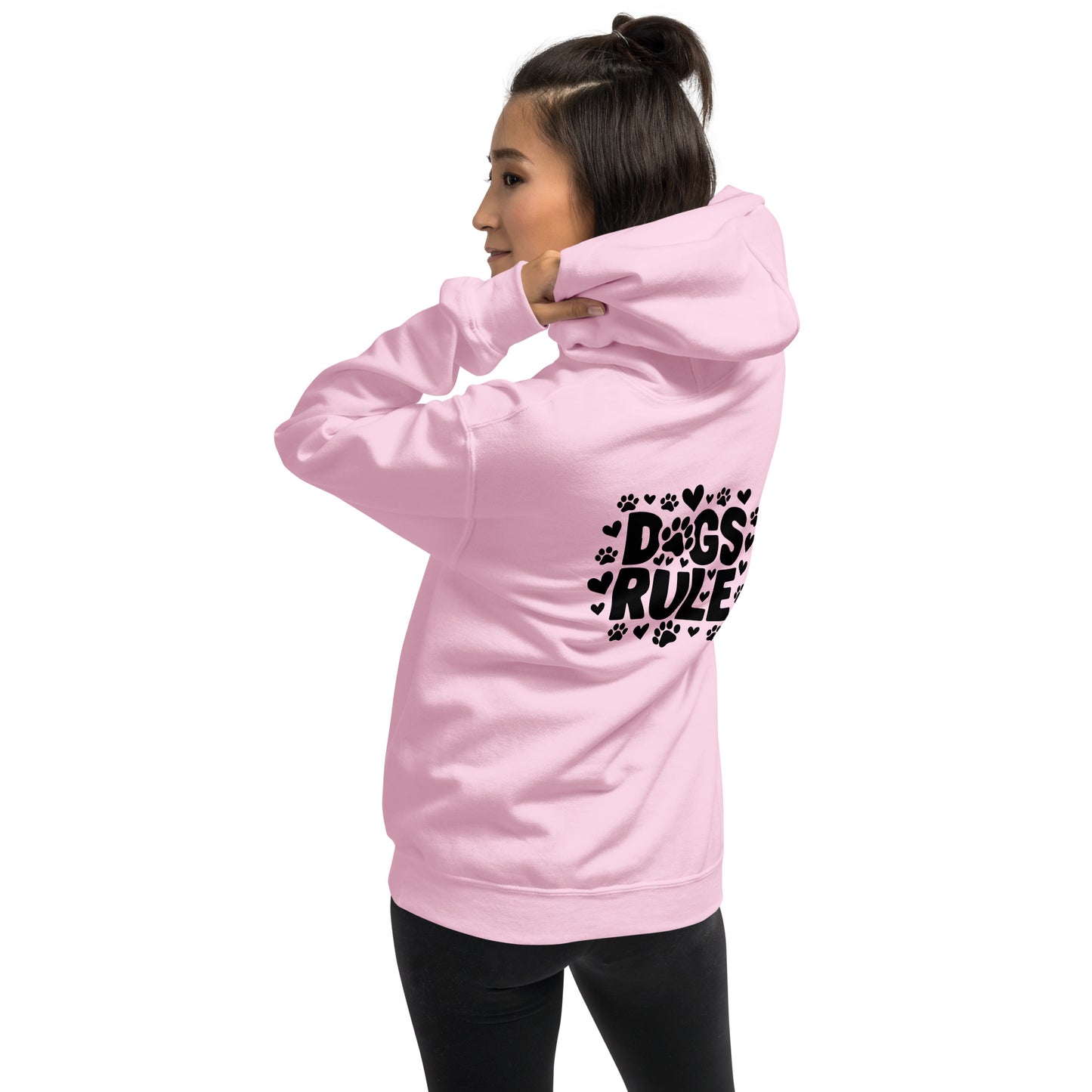 Cozy unisex pink hoodie for canine enthusiasts. Dogs Rule, proclaims your love for furry friends. Soft, warm fabric perfect for dog walks or lounging.