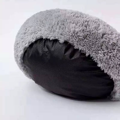 Introducing the Cozy Plush Pet Bed, the ultimate nap spot for your furry friend! This ultra-soft and snuggly bed is designed for pets of all shapes and sizes, offering superior comfort and coziness. With its plush fabric and adorable design, your pet will love curling up for a restful snooze. The non-slip base ensures stability, making it a safe and secure choice for your home. Easy to clean and perfect for pampered pets, this bed is a must-have for keeping your cat or dog cozy and happy.