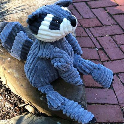 HuggleHounds Reggie Raccoon Knottie® plush dog toy with soft fabric and embroidered raccoon face for cuddly play.
