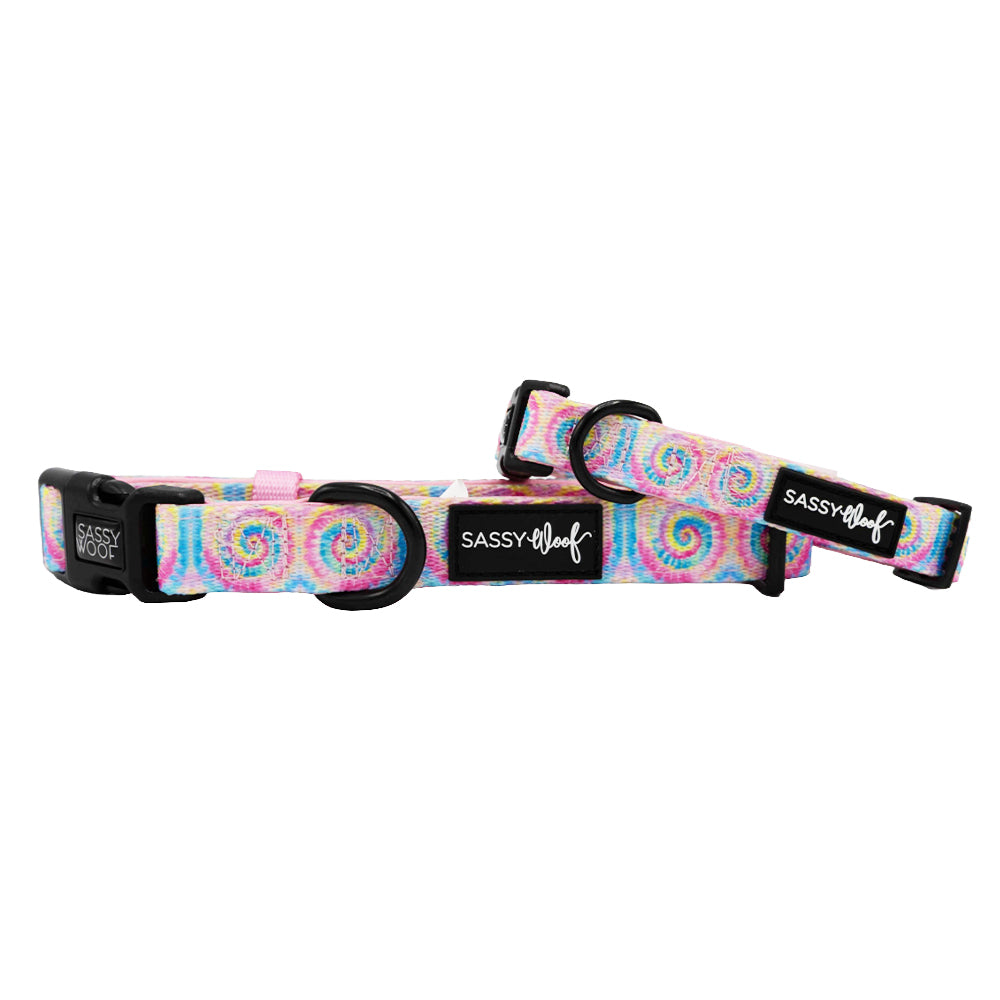Colorful tie-dye dog collar by Sassy Woof with "Good Vibes" design, made for pet collars and harnesses.