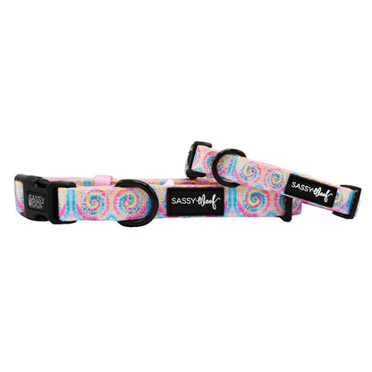 Colorful tie-dye dog collar by Sassy Woof with "Good Vibes" design, made for pet collars and harnesses.