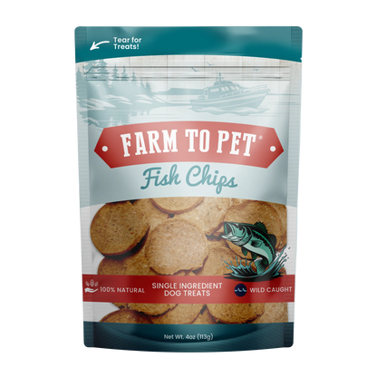 A 4 oz stand-up pouch of Farm to Pet Fish Chips single-ingredient dog treats, featuring a teal and red design with a clear window showing the round fish chips inside.