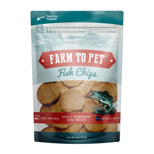 A 4 oz stand-up pouch of Farm to Pet Fish Chips single-ingredient dog treats, featuring a teal and red design with a clear window showing the round fish chips inside.