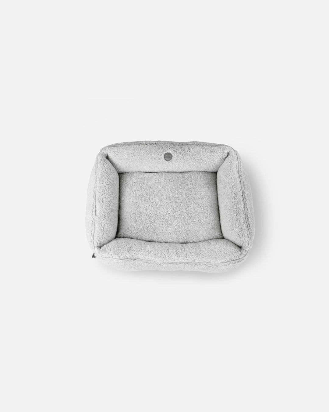 Chester and Lee Furry Sleeper dog bed top view – soft gray furry material detail