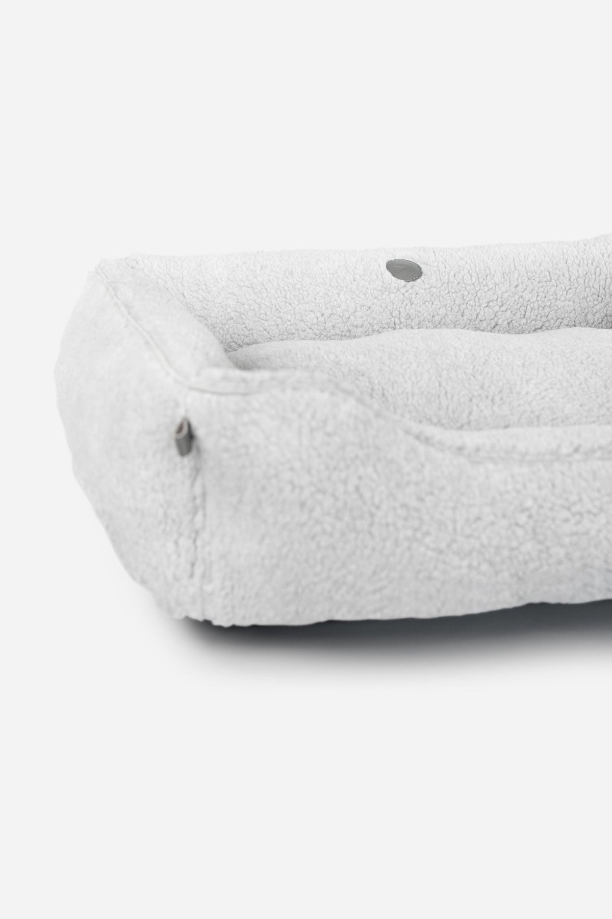 Gray Chester & Lee furry sleeper dog bed with soft, plush material, ideal for small to medium-sized pets.