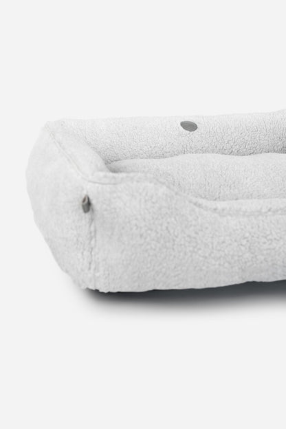 Gray Chester & Lee furry sleeper dog bed with soft, plush material, ideal for small to medium-sized pets.
