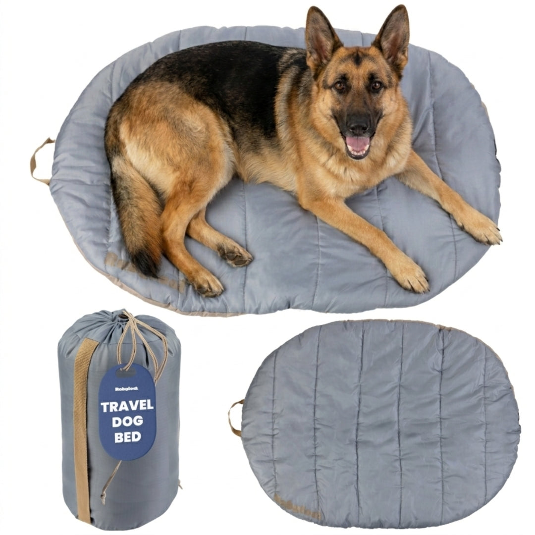 A happy German Shepherd relaxing on a light grey Rubyloo extra-large portable dog bed with an included travel carry bag.