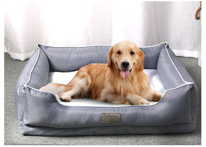 ⁠A happy golden retriever resting comfortably inside a premium grey textured orthopedic dog bed with a plush white cushion from Paws & Pockets