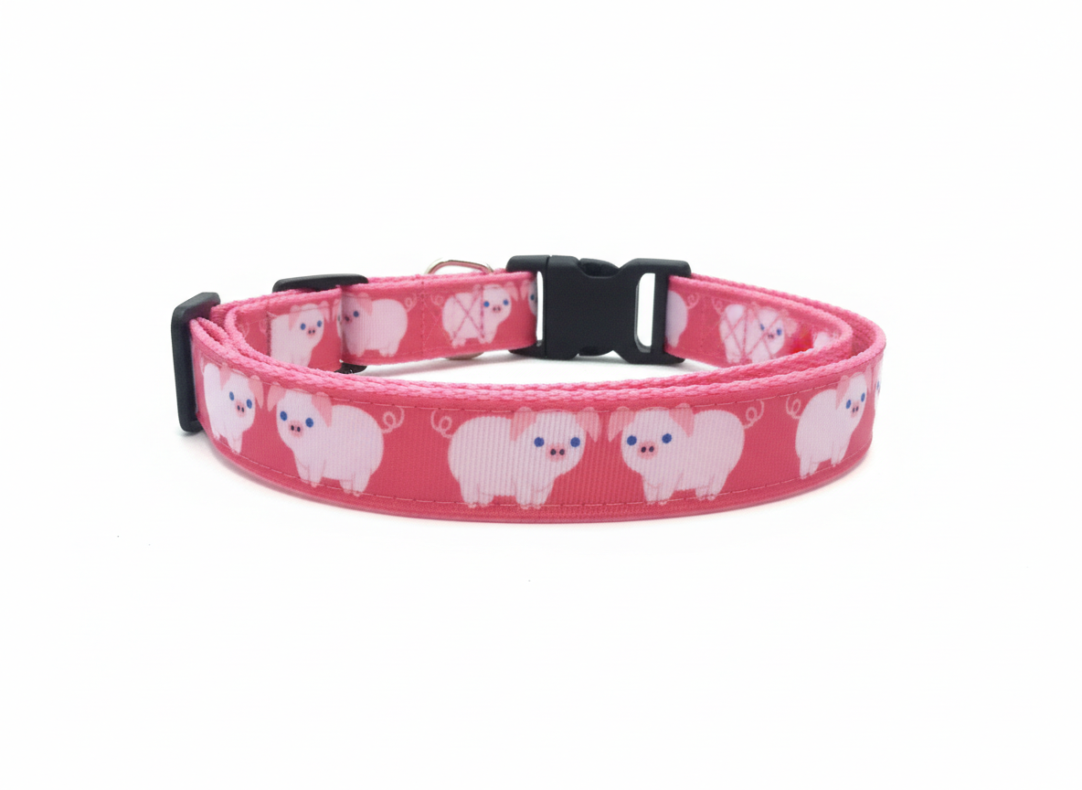 Pink dog collar with white bear pattern on a white background
