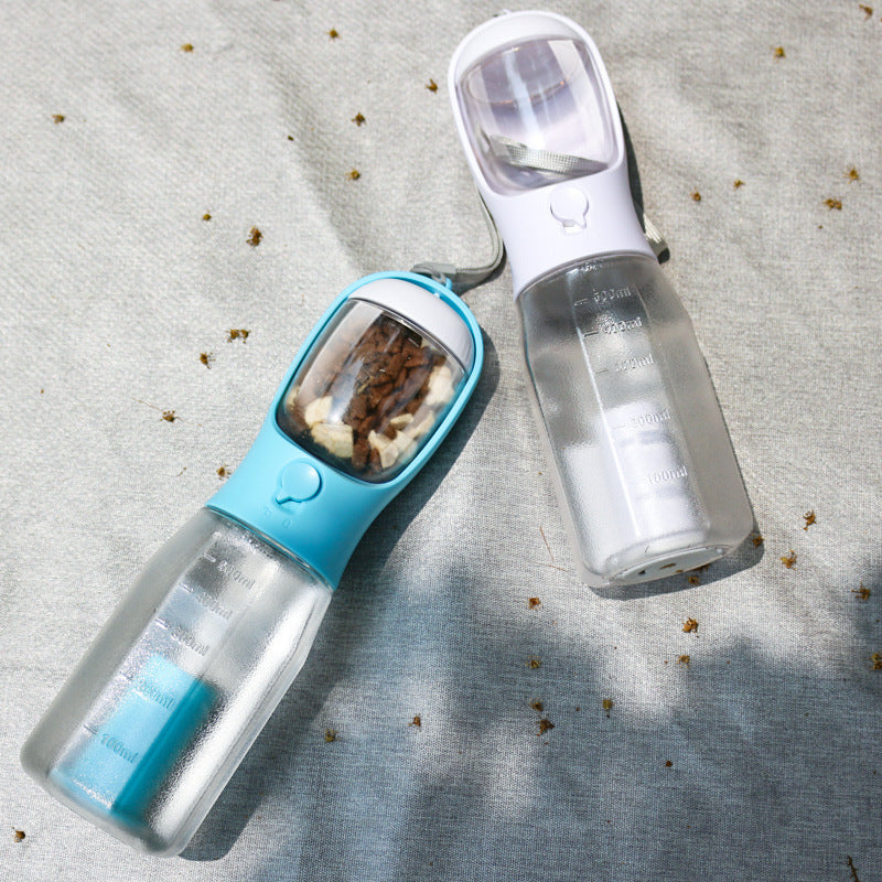 Portable dog water bottle for hiking with close-up view of the spout and reservoir