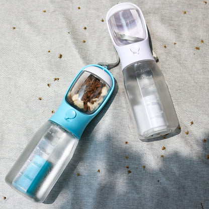 Portable dog water bottle for hiking with close-up view of the spout and reservoir