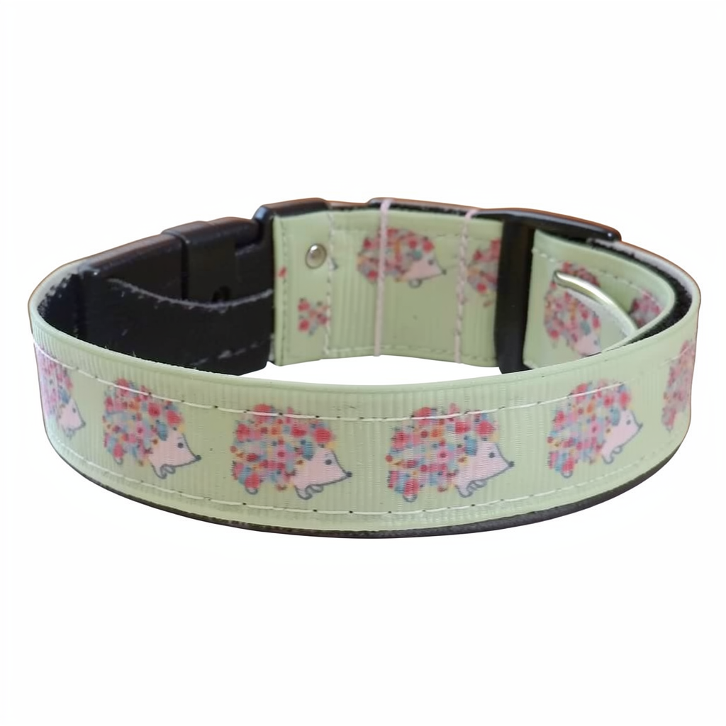 Step up your pup's style with our hedgehog print small dog collar, perfect for the adventurous Corgi or any small breed. Featuring a whimsical hedgehog and floral design on a soft green background, this adjustable collar is both durable and stylish for trips to the beach or everyday walks.