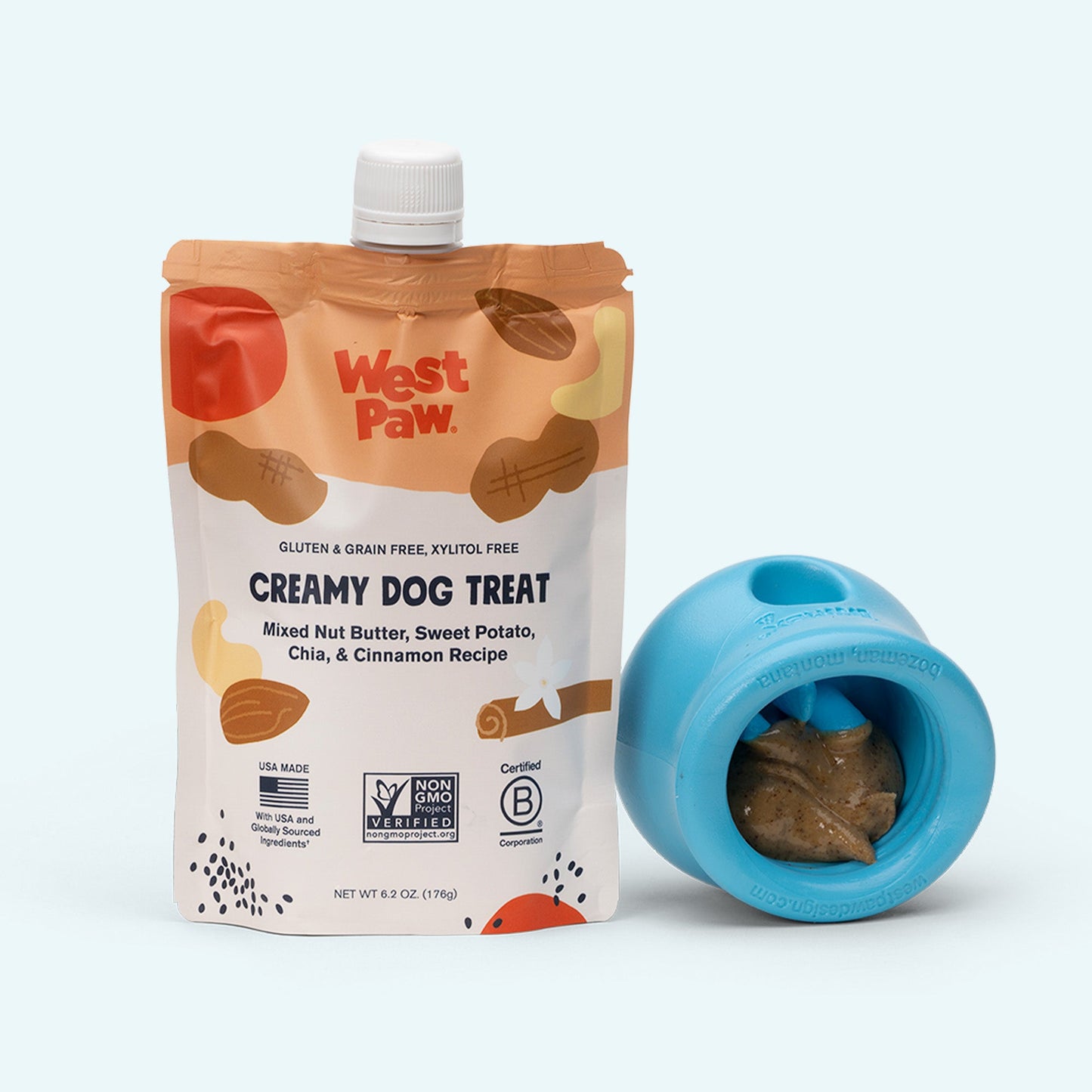 Dog enjoying the West Paw Nut Butter, Sweet Potato, and Chia Seed treat